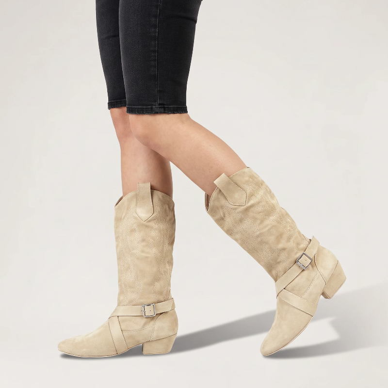 Yehaw beige vegan suede mid-calf cowgirl boots with a round toe, low heel, and decorative buckle strap detail.