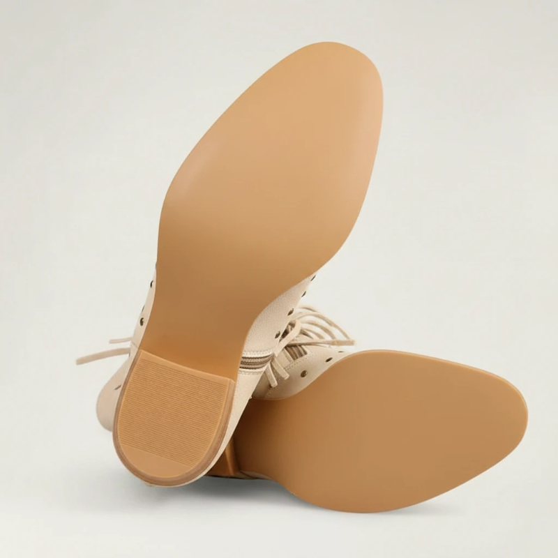 Yehaw beige vegan leather mid-calf cowgirl boots with fringe detailing, round toe, and side zip closure.