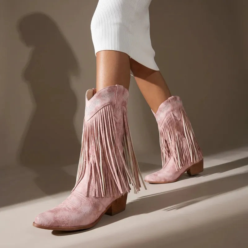 Yehaw pink vegan leather cowgirl boots with fringe and pointed toe, mid-calf height.