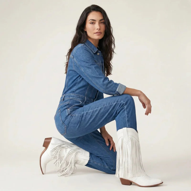 Model wearing Yehaw white vegan leather mid-calf cowgirl boots with fringe detail and pointed toe