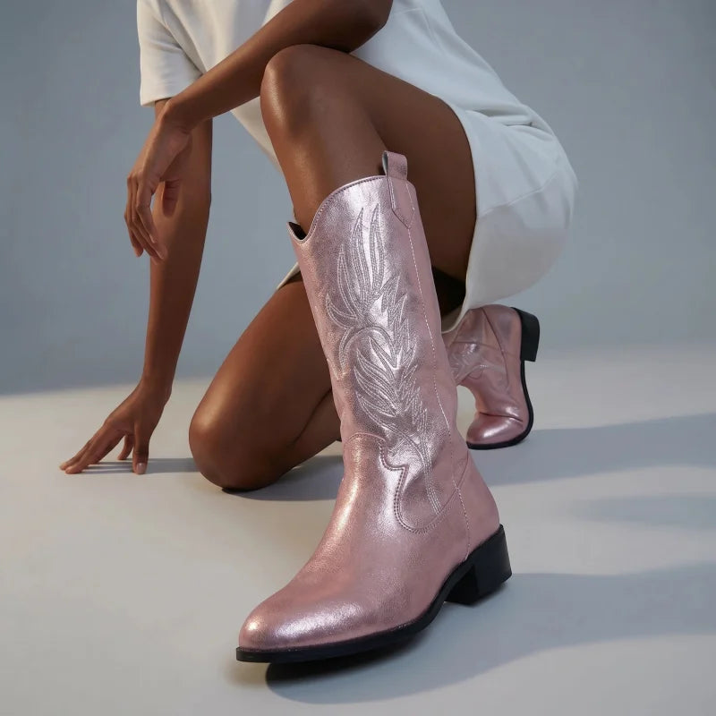 Yehaw pink vegan leather mid-calf cowgirl boots with pointed toe and western embroidery worn by a model