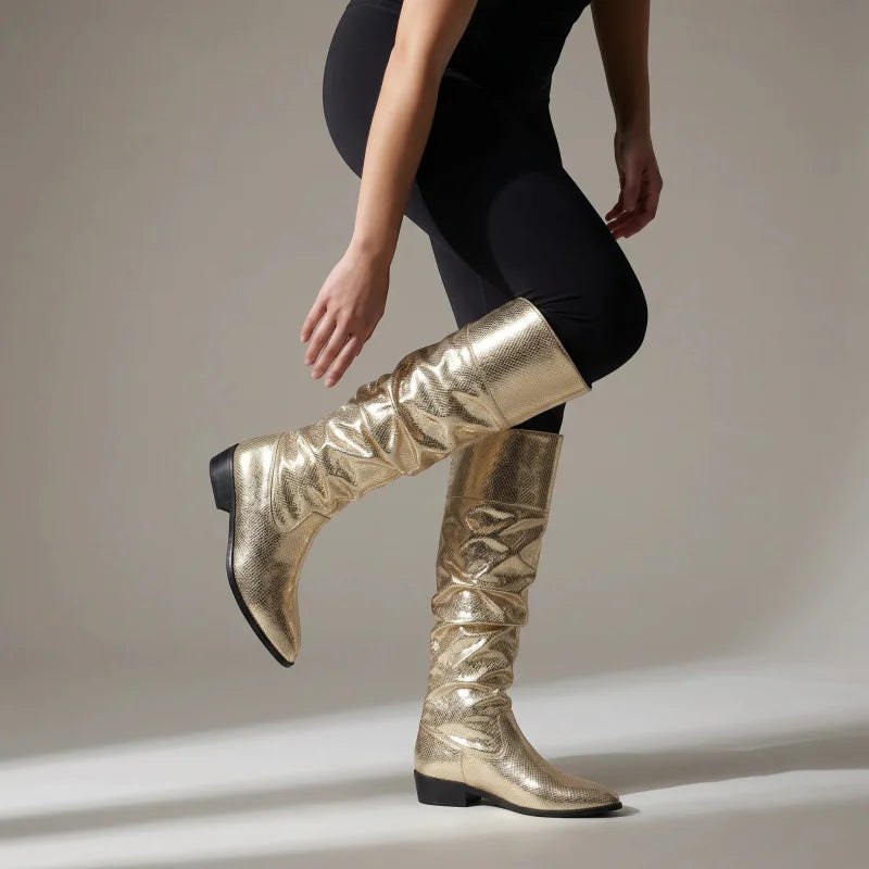 Yehaw gold vegan microfibre mid-calf cowgirl boots with a pointed toe and low heel worn by a model.