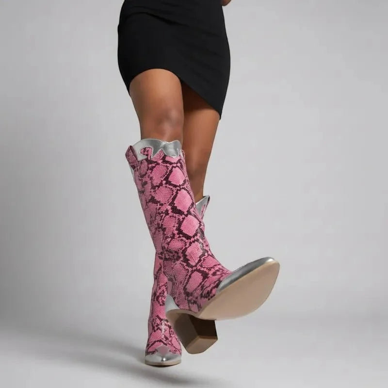 Yehaw pink and silver vegan leather knee-high cowgirl boots with pointed toe and block heel.