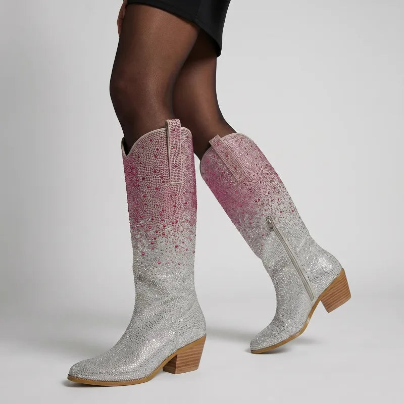 Yehaw knee-high vegan leather cowgirl boots with pink and silver rhinestones and a pointed toe.