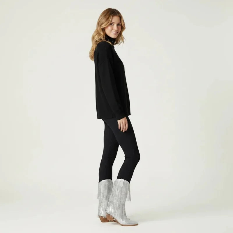 Model wearing Yehaw silver knee-high vegan microfibre cowgirl boots with fringe detail and pointed toe