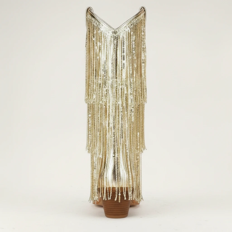 Yehaw gold vegan leather mid-calf cowgirl boots with long shimmering fringe and a pointed toe.