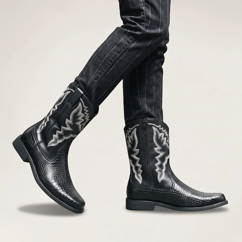 Yehaw black vegan leather cowboy boots with white western stitching, mid-calf height, and side zip on a model.