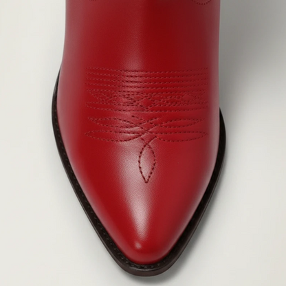 Yehaw red vegan leather mid-calf cowgirl boots with white heart embroidery, pointed toe, and stacked block heel.