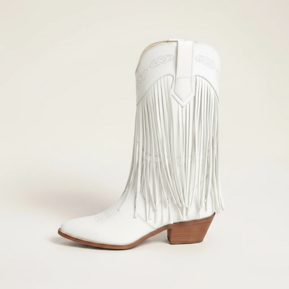 Yehaw Alejandra white vegan leather mid-calf cowgirl boots with fringe detail and pointed toe worn with blue jeans