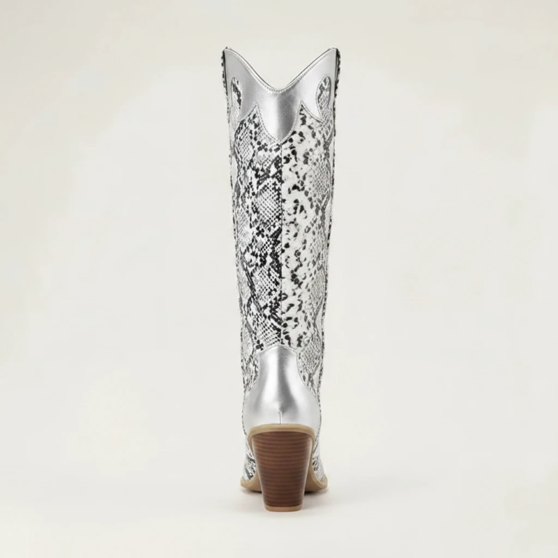 Yehaw Clementine knee-high cowboy boots in silver and black snakeskin-print vegan leather with a pointed toe