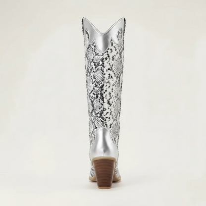 Yehaw Clementine knee-high cowboy boots in silver and black snakeskin-print vegan leather with a pointed toe