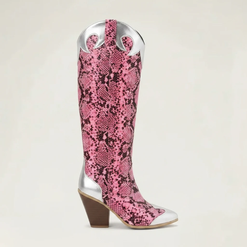 Yehaw Clementine knee-high cowgirl boots in pink snakeskin vegan leather with silver metallic accents and pointed toe.