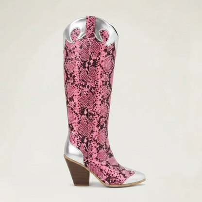 Yehaw Clementine knee-high cowgirl boots in pink snakeskin vegan leather with silver metallic accents and pointed toe.
