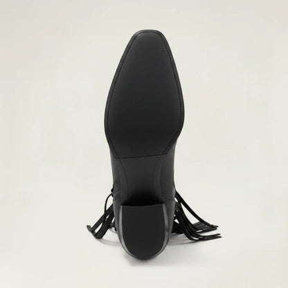 Yehaw DALIA black vegan leather ankle cowgirl boots with fringe detailing and a pointed toe on a neutral background.