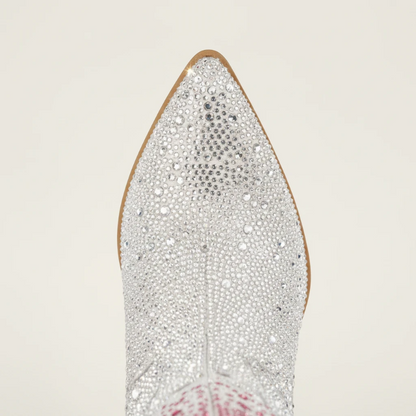 Yehaw knee-high vegan leather cowgirl boots with pink and silver rhinestones and a pointed toe.