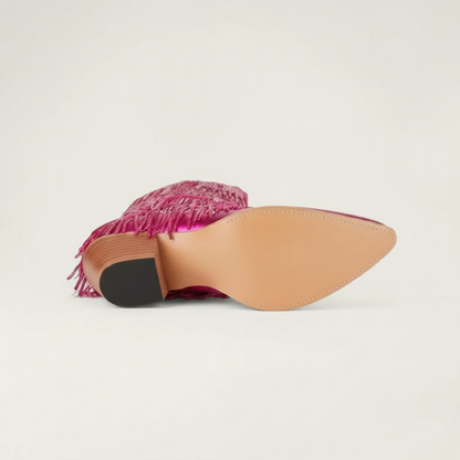 Yehaw pink metallic vegan leather cowgirl boots with long sequin fringe and a pointed toe.