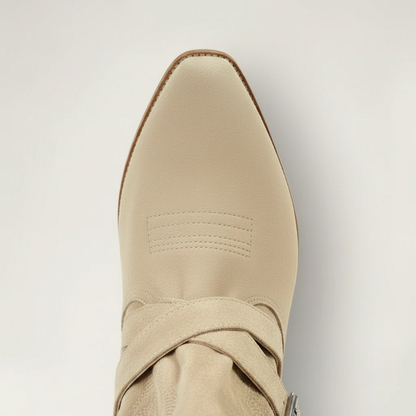 Yehaw beige vegan suede mid-calf cowgirl boots with a round toe, low heel, and decorative buckle strap detail.