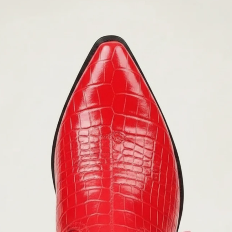 Yehaw red knee-high vegan leather cowgirl boots with fringe detail and square toe worn by a model