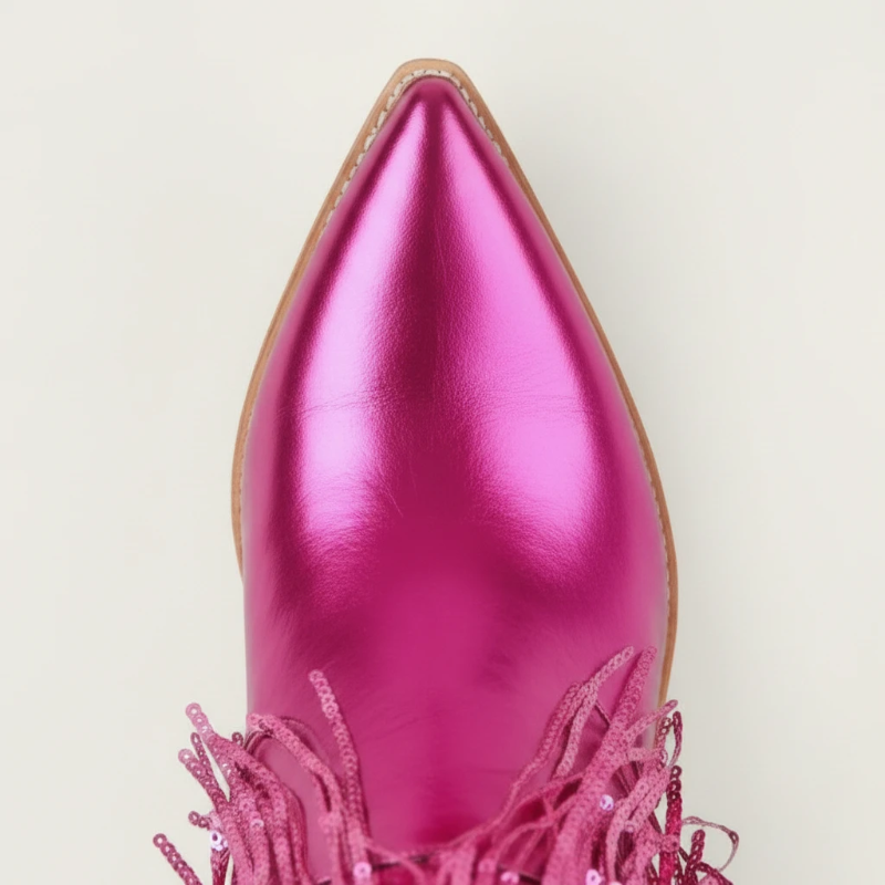 Yehaw pink metallic vegan leather cowgirl boots with long sequin fringe and a pointed toe.