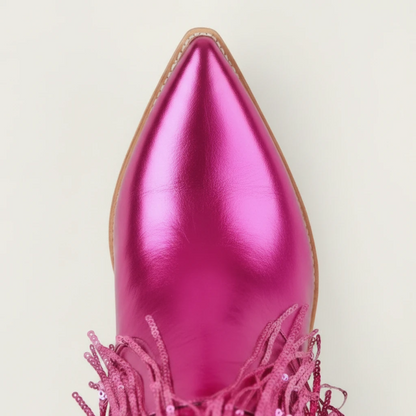Yehaw pink metallic vegan leather cowgirl boots with long sequin fringe and a pointed toe.