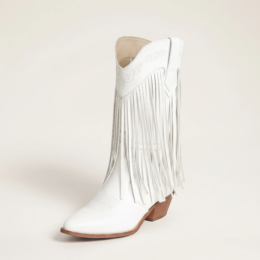 Yehaw Alejandra white vegan leather mid-calf cowgirl boots with fringe detail and pointed toe worn with blue jeans