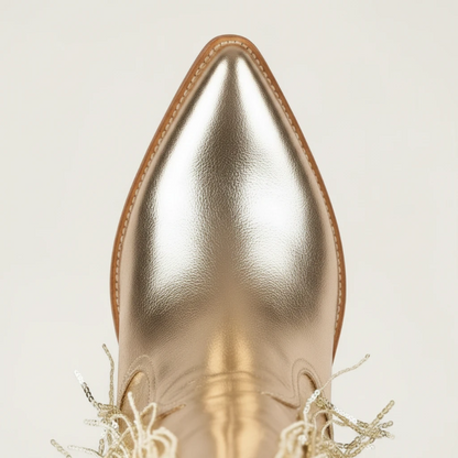 Yehaw gold vegan leather mid-calf cowgirl boots with long shimmering fringe and a pointed toe.