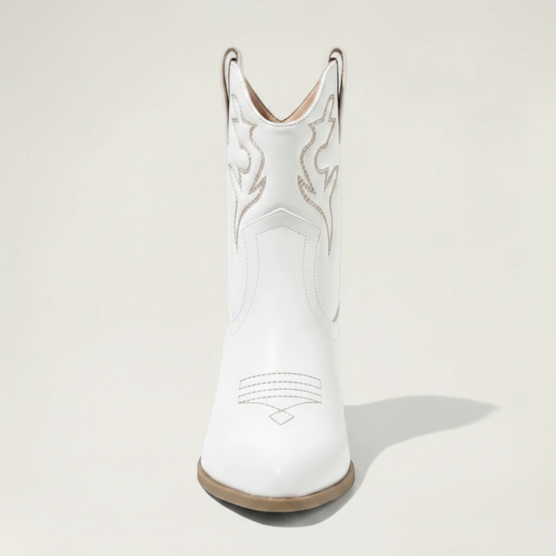 Yehaw white vegan leather ankle-height cowgirl boots with pointed toe and high heel.