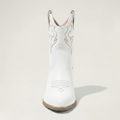 Yehaw white vegan leather ankle-height cowgirl boots with pointed toe and high heel.