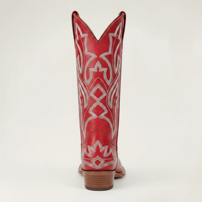 Yehaw red vegan leather mid-calf cowgirl boots with intricate white western embroidery and a medium block heel.