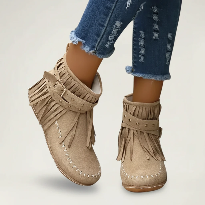 Yehaw beige vegan suede ankle cowgirl boots with fringe detail, side buckle, and flat rubber sole