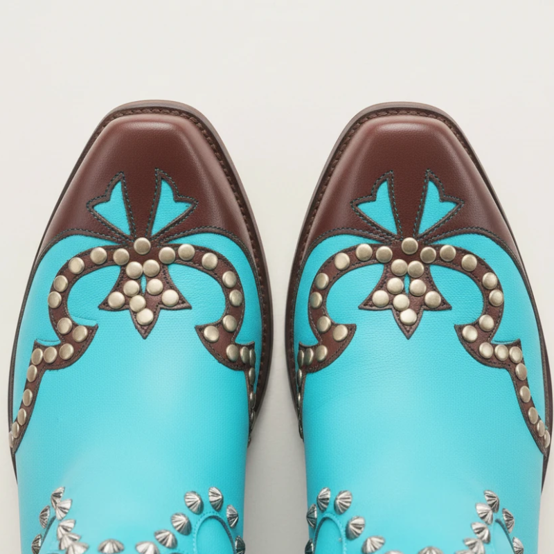 Yehaw ADELE knee-high turquoise vegan leather cowgirl boots with brown trim, silver studs, and decorative fringe
