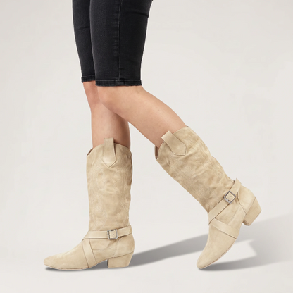 Yehaw beige vegan suede mid-calf cowgirl boots with a round toe, low heel, and decorative buckle strap detail.