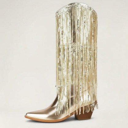 Yehaw gold vegan leather mid-calf cowgirl boots with long shimmering fringe and a pointed toe.