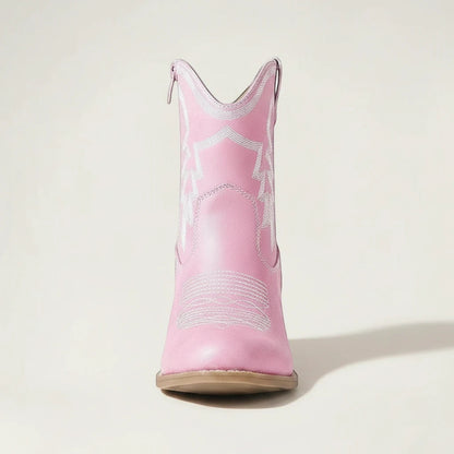 Yehaw pink vegan leather ankle cowgirl boots with white western stitching and a pointed toe