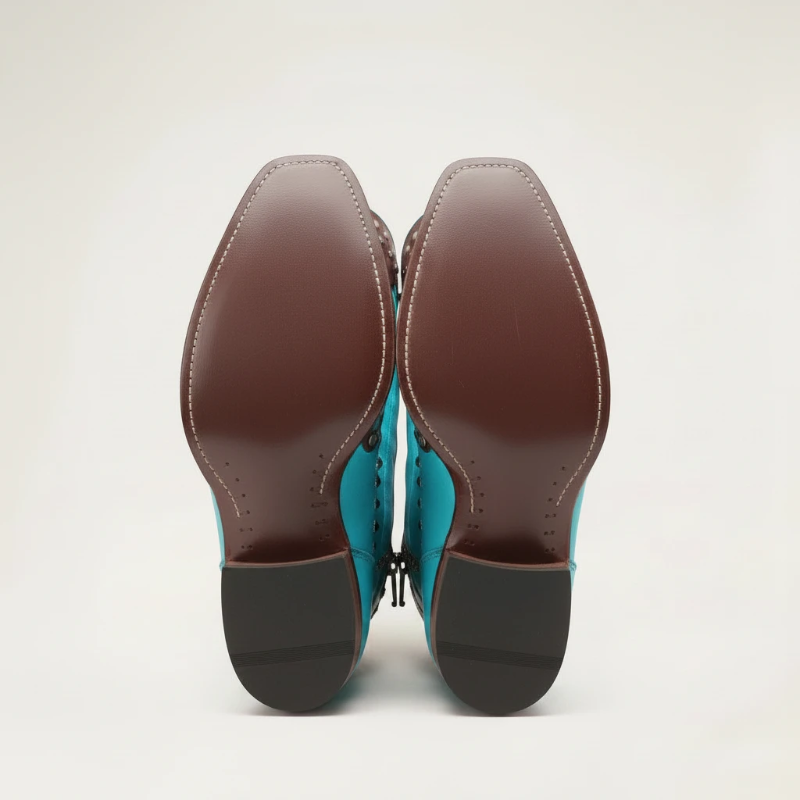 Yehaw ADELE knee-high turquoise vegan leather cowgirl boots with brown trim, silver studs, and decorative fringe