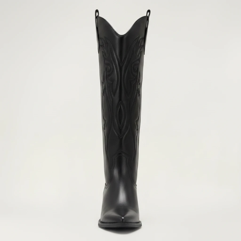 Yehaw black vegan leather knee-high cowgirl boots with pointed toe and medium heel. Zip fastening.