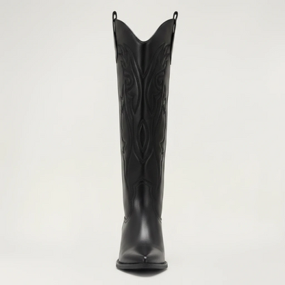 Yehaw black vegan leather knee-high cowgirl boots with pointed toe and medium heel. Zip fastening.