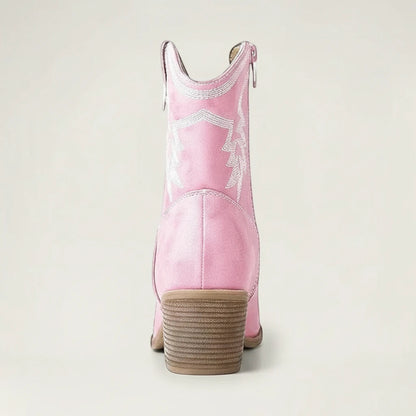 Yehaw pink vegan leather ankle cowgirl boots with white western stitching and a pointed toe