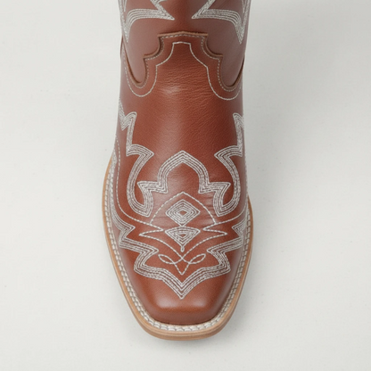 Yehaw brown vegan leather mid-calf cowgirl boots with white western embroidery and a round toe design.