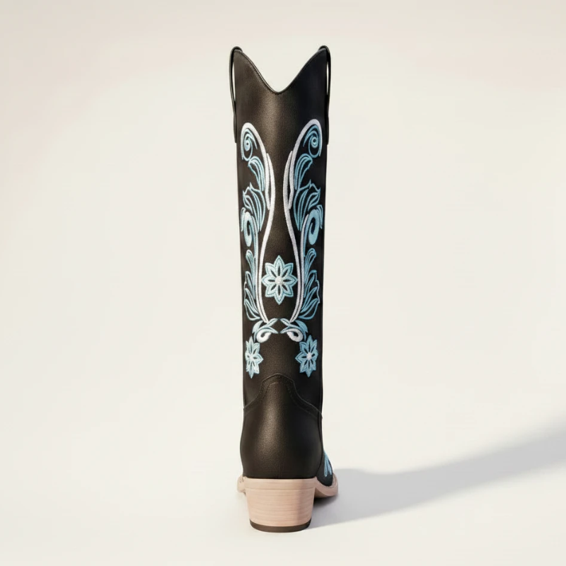 Yehaw Adriana black vegan suede mid-calf cowgirl boots with intricate light blue floral embroidery and a round toe.