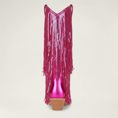 Yehaw pink metallic vegan leather cowgirl boots with long sequin fringe and a pointed toe.