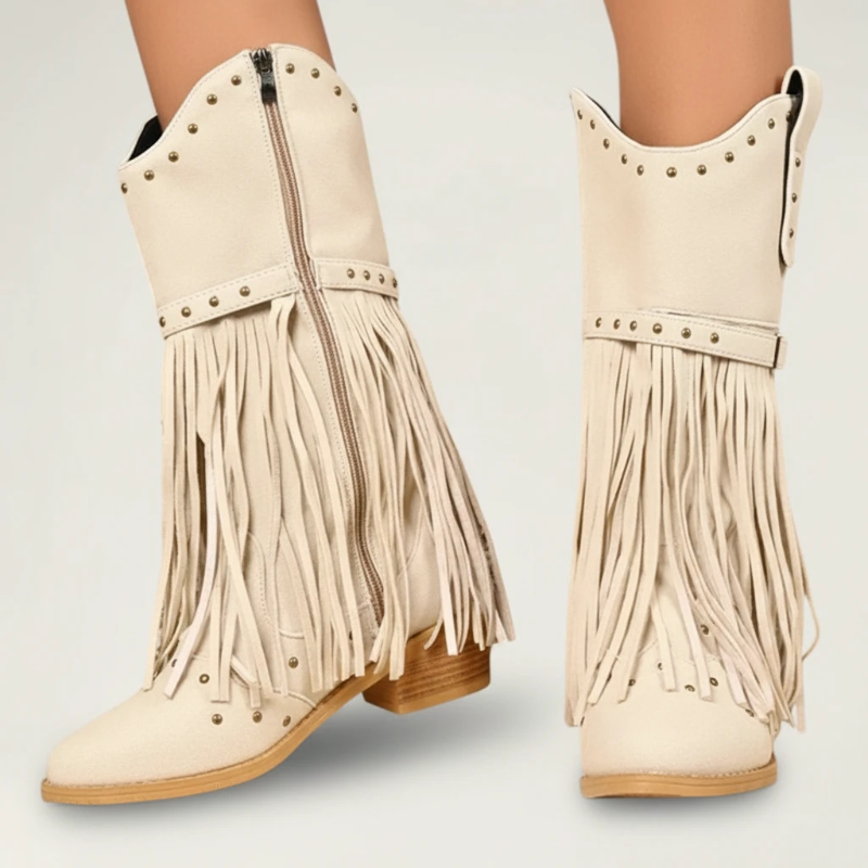 Yehaw beige vegan leather mid-calf cowgirl boots with fringe detailing, round toe, and side zip closure.