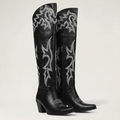 Yehaw BEATRICE black vegan leather knee-high cowgirl boots with white western embroidery and a pointed toe.