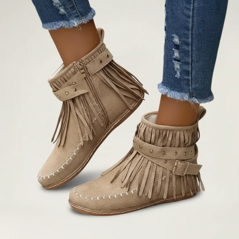Yehaw beige vegan suede ankle cowgirl boots with fringe detail, side buckle, and flat rubber sole