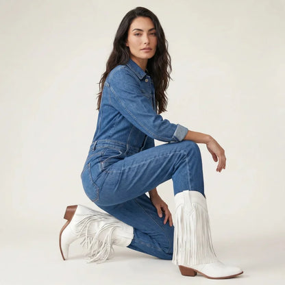 Model wearing Yehaw white vegan leather mid-calf cowgirl boots with fringe detail and pointed toe