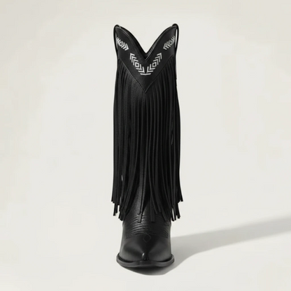 Yehaw black vegan leather mid-calf cowgirl boots with fringe detailing and white embroidered western patterns.