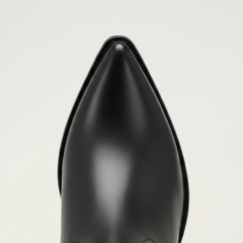 Yehaw black vegan leather knee-high cowgirl boots with pointed toe and medium heel. Zip fastening.