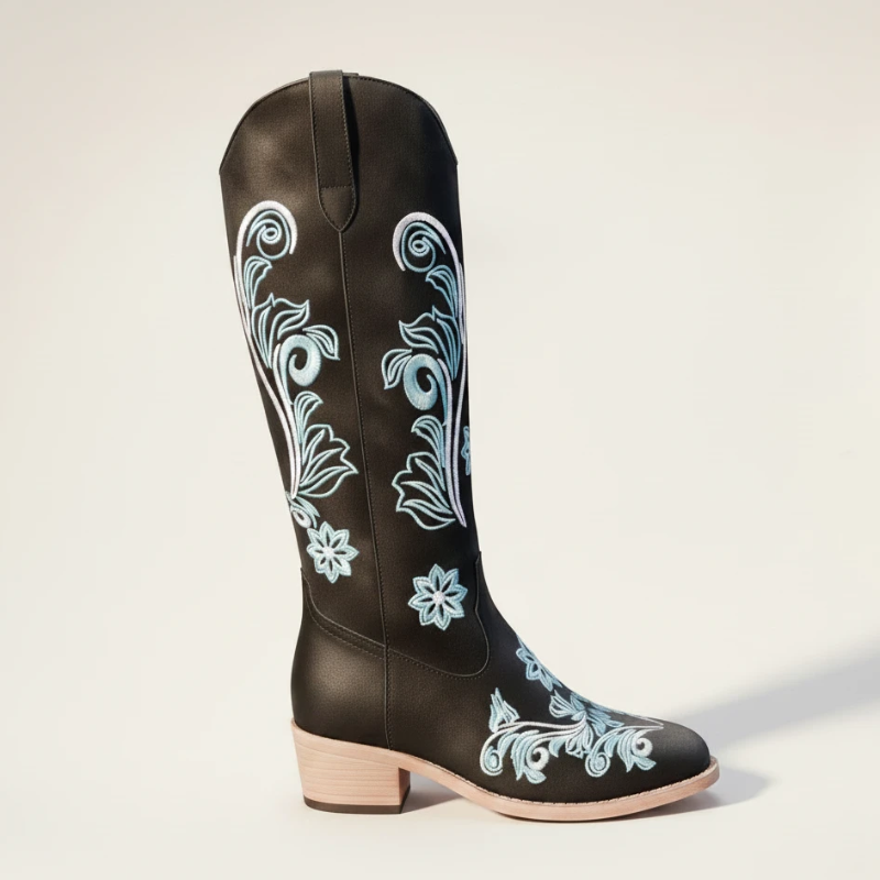 Yehaw Adriana black vegan suede mid-calf cowgirl boots with intricate light blue floral embroidery and a round toe.