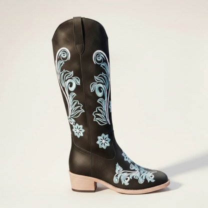 Yehaw Adriana black vegan suede mid-calf cowgirl boots with intricate light blue floral embroidery and a round toe.