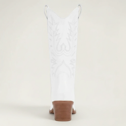 Yehaw white vegan leather mid-calf cowgirl boots with pointed toe and medium heel.